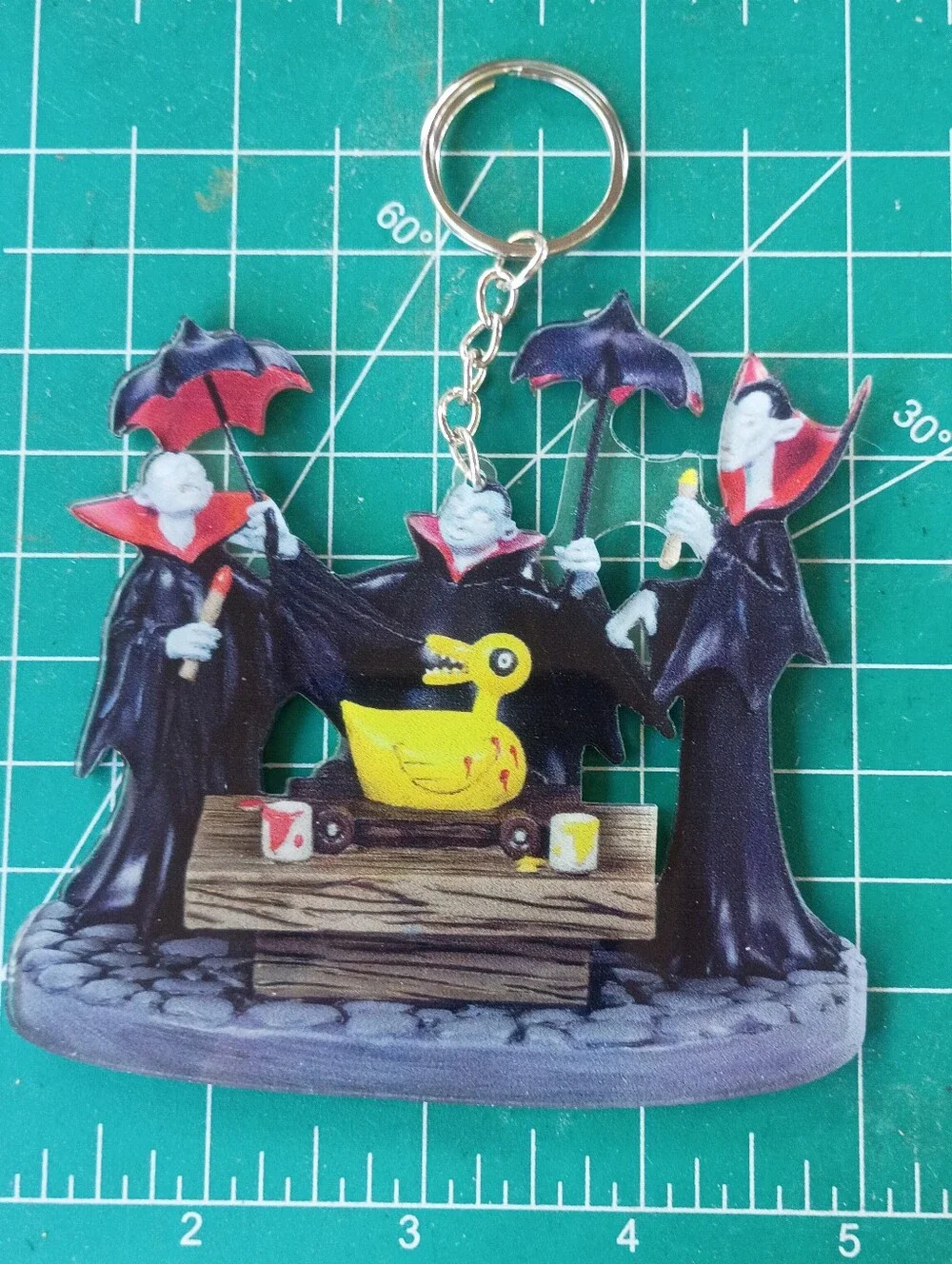The Nightmare Before Christmas Black and Red Vampire Bird Keychain Yellow Duck